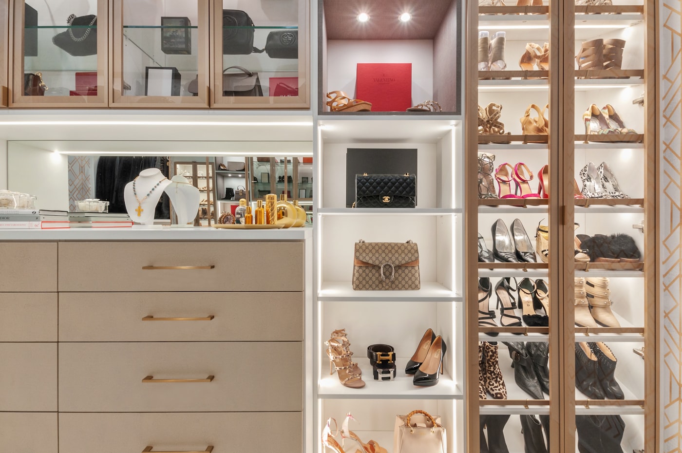 A bespoke walk-in wardrobe with display shelving